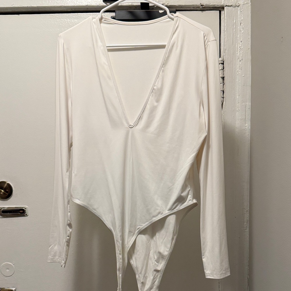 Elegant White V-Neck Bodysuit
